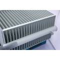 Corrugated fin radiator transformer