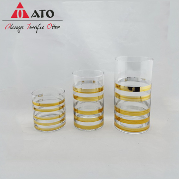 Clear Tumbler drinking glass with Golden circles cup