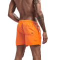 กางเกงขาสั้นกีฬาของผู้ชายส้มที่กำหนดเอง