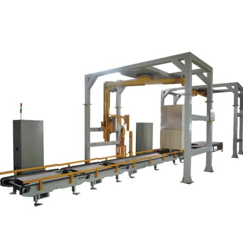 Rotary arm stretch packaging machine