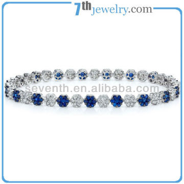 Small Flower Shaped Blue And White CZ Diamond Rhodioum Plated Tennis Diamond Bracelet