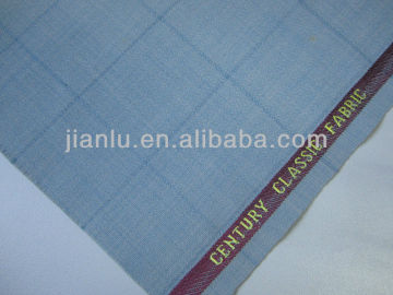 wool/poly fabric with golden selvedge