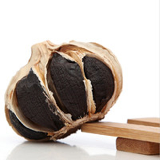 Cook raw whole black garlic