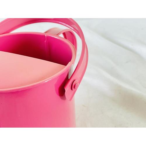 Pink metal kids watering can