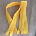 Promotional yellow plastic separating coat zippers