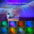 Um projetor de galáxia com luar e controle remoto