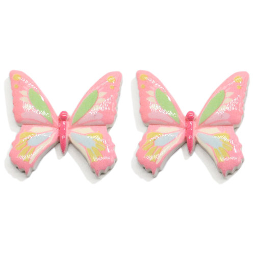 Hot Selling 100Pcs / Lot Schmetterlingsharz Flatback Cabochon Kawaii Schmetterling Verschönerung für Scrapbooking Haarschleifen Handwerk