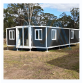 Casa de contenedor expandible para paquete plano para campamento/hotel