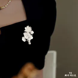 Sterling silver lotus brooch