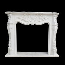 Elegant White Stone Fireplace with Detailed Carvings