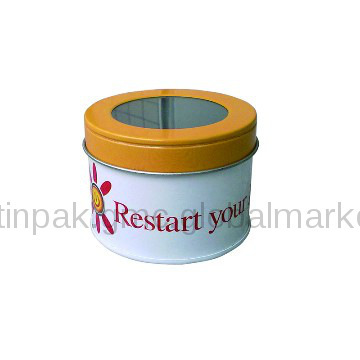 Round tin box with clear lid