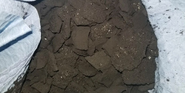 Hard carbon deposition on thermal oil