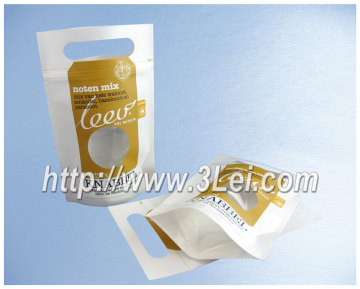 Kraft paper stand up pouch with oval window