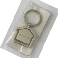 Porte-clés rotatif de forme de maison en métal de cadeau de centre de ventes