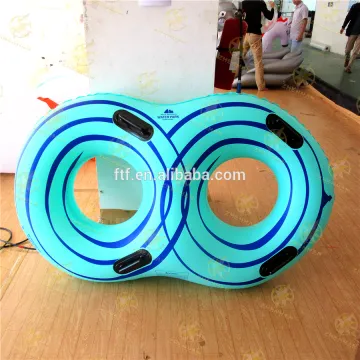 blue romantic couples synchronized double laps swimming ring