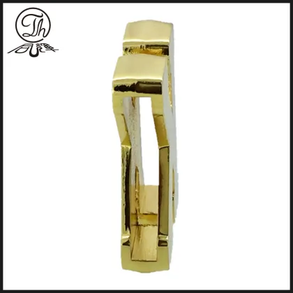 Gold K letter plate on the leather bag