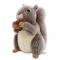 A stuffed gray squirrel that eats chestnuts