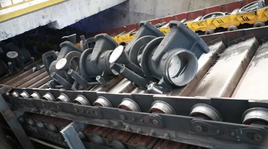 Slat conveyor dengan otomatisasi