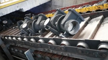 Slat conveyor with automation