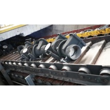 Slat conveyor dengan otomatisasi