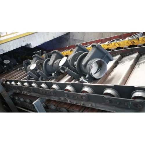 Slat conveyor dengan otomatisasi