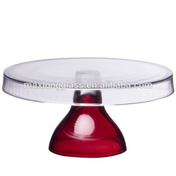 Hand-made cake stand with red stem