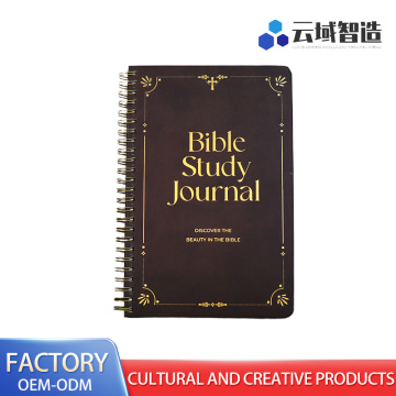 Livro de estudo bíblico organizado com bobina
