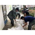 Water absorbent flood barrier sandbag for homes