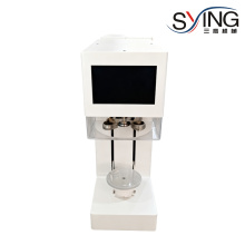 Sealing machine for beverage cans