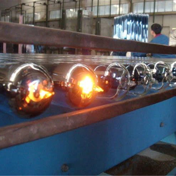 Inducción de sujetadores a través de la línea de calentamiento