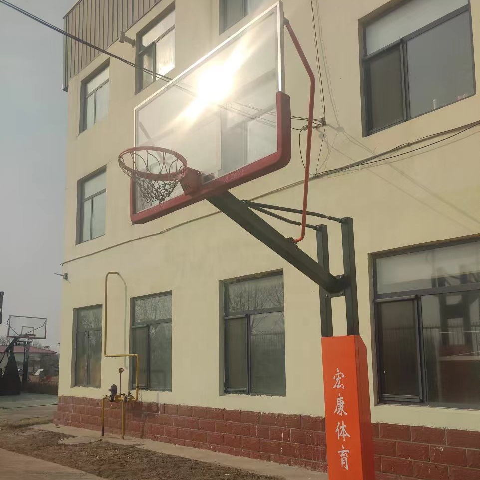 Commercial-grade buried basketball hoop for parks