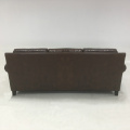 Three person shiny leather sofa