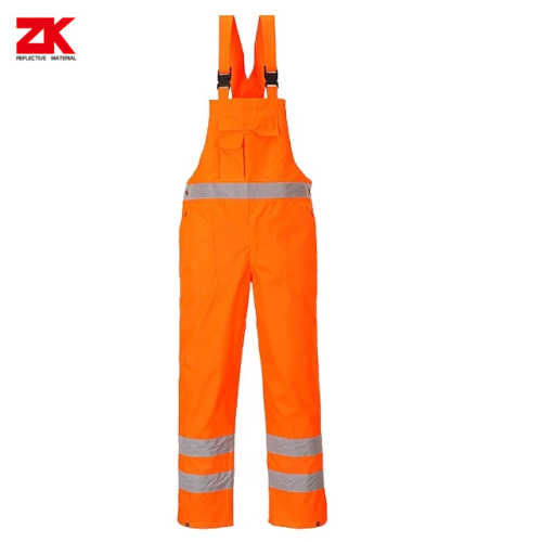 Safety bib pants at work in traffic