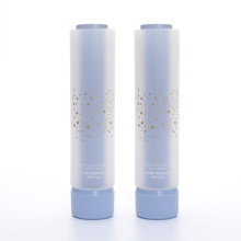 Tubo de doble cámara para lavado facial y loción corporal