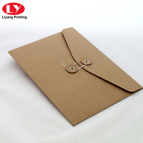 Brown kraft envelope with string and button