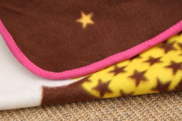 Printed polar fleece blanket with hemming edge