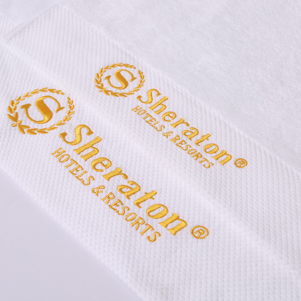 Serviette d'hôtel avec logo de broderie personnalisé