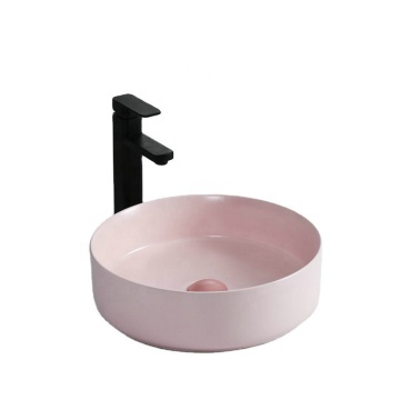 โรงงานในห้องน้ำของจีนการขายโดยตรงยอดขายเซรามิกวงรีสีชมพูอ่าง Countertop Sinks