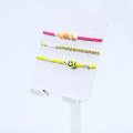 Bracelet élastique de perle en verre de visage smiley jaune