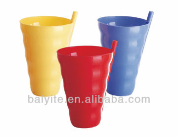 colored plastic drinking cup with straw