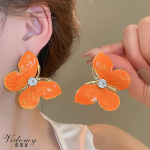 Playful Exaggerated Butterfly Earrings in Rainbow Hues