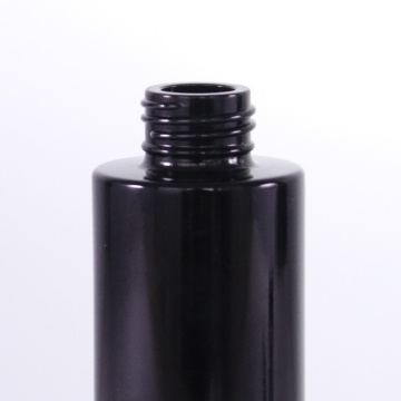 Matte black glass lotion bottle with wooden cap