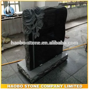 modern grave stones of granite with rose