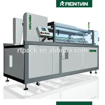 Secondary packaging machine with corugated box eractor