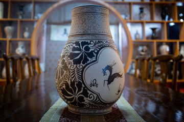 Underglaze painted antique wide mouth bottle