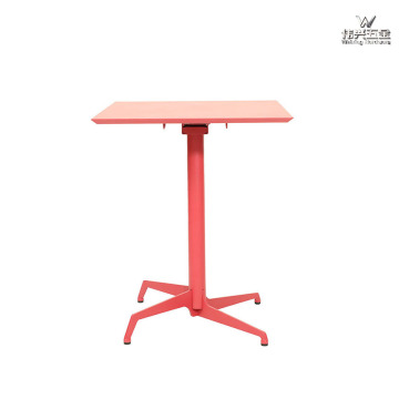 Dining table with a steel base