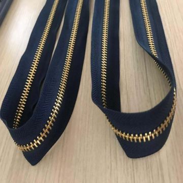 Continuous unique golden metal zippers for coat