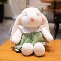 The white rabbit plush toys in dress