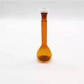 Flacon volumétrique en verre ambre avec bouchon de 100 ml