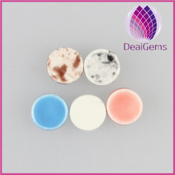 Bead ceramic 9mm flat round.